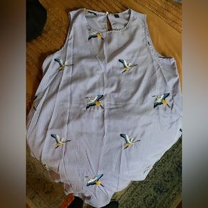 Striped dress with embroidered birds